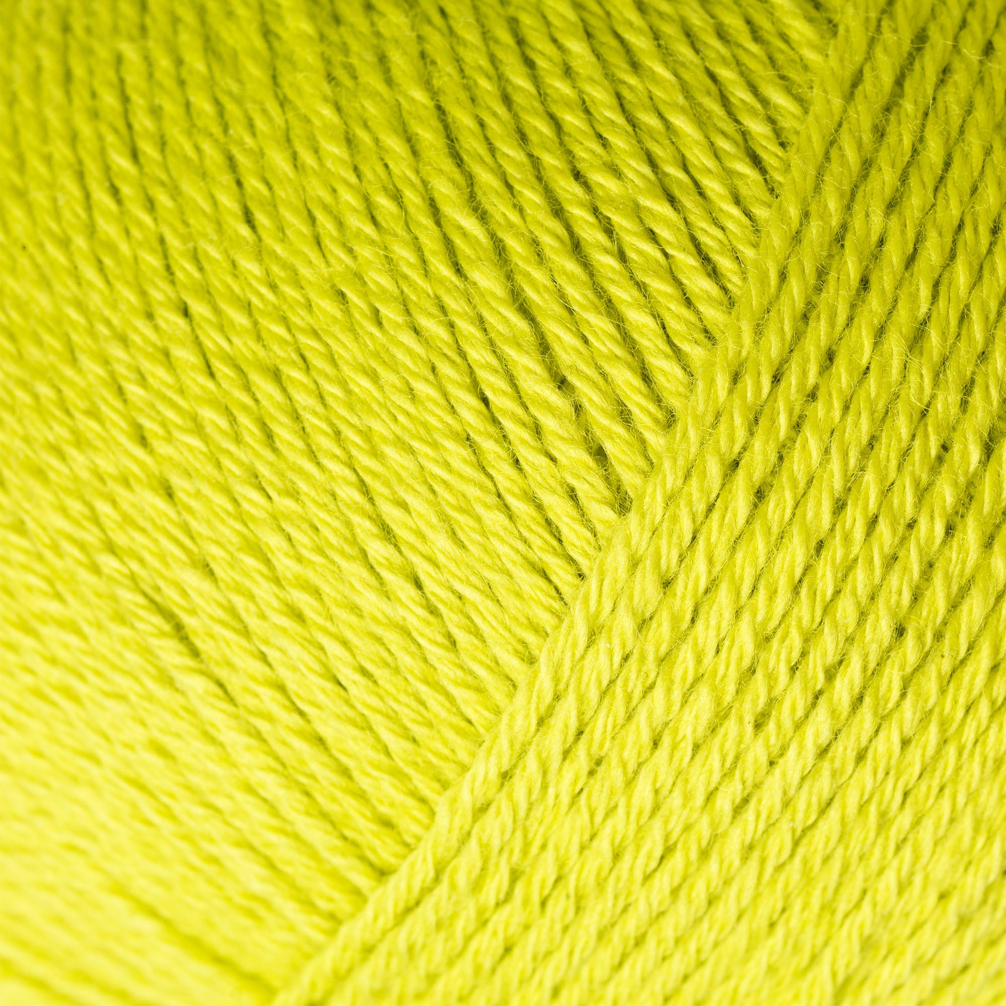 Canlı lime sarısı Knitting for Olive Cotton Merino, yumuşak ve nefes alabilir yapısıyla her projeye canlılık katar.