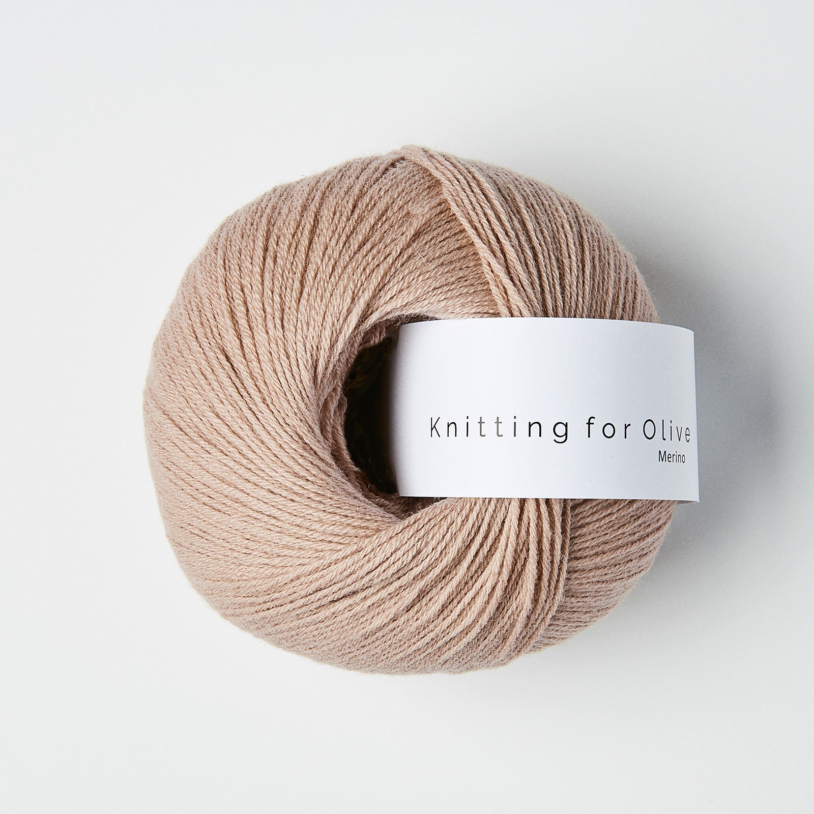 Knitting for Olive Merino Mushroom Rose ile yumuşak pembe tonu ve kalıcı konforu keşfedin.