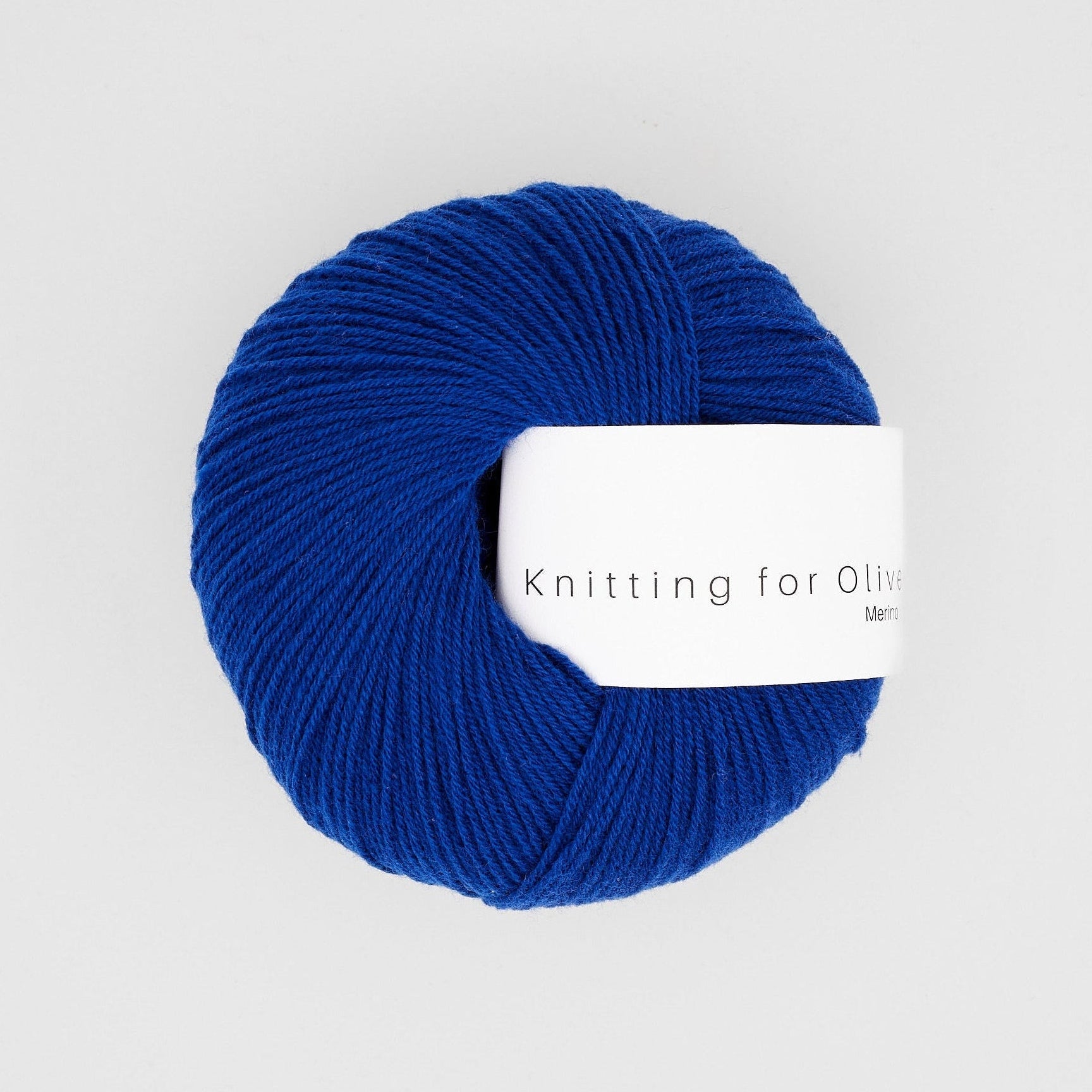 Knitting for Olive Merino Peacock yumuşak merinos yününün canlı tavus kuşu yeşili tonu.