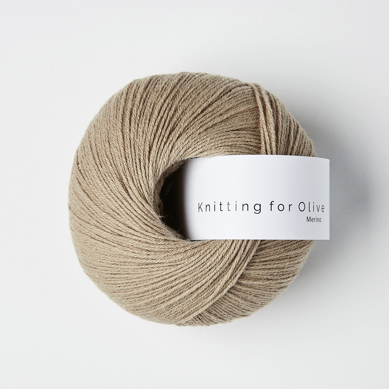 Knitting for Olive Merino ile örülmüş yumuşak dokulu ve şık bir Trenchcoat.