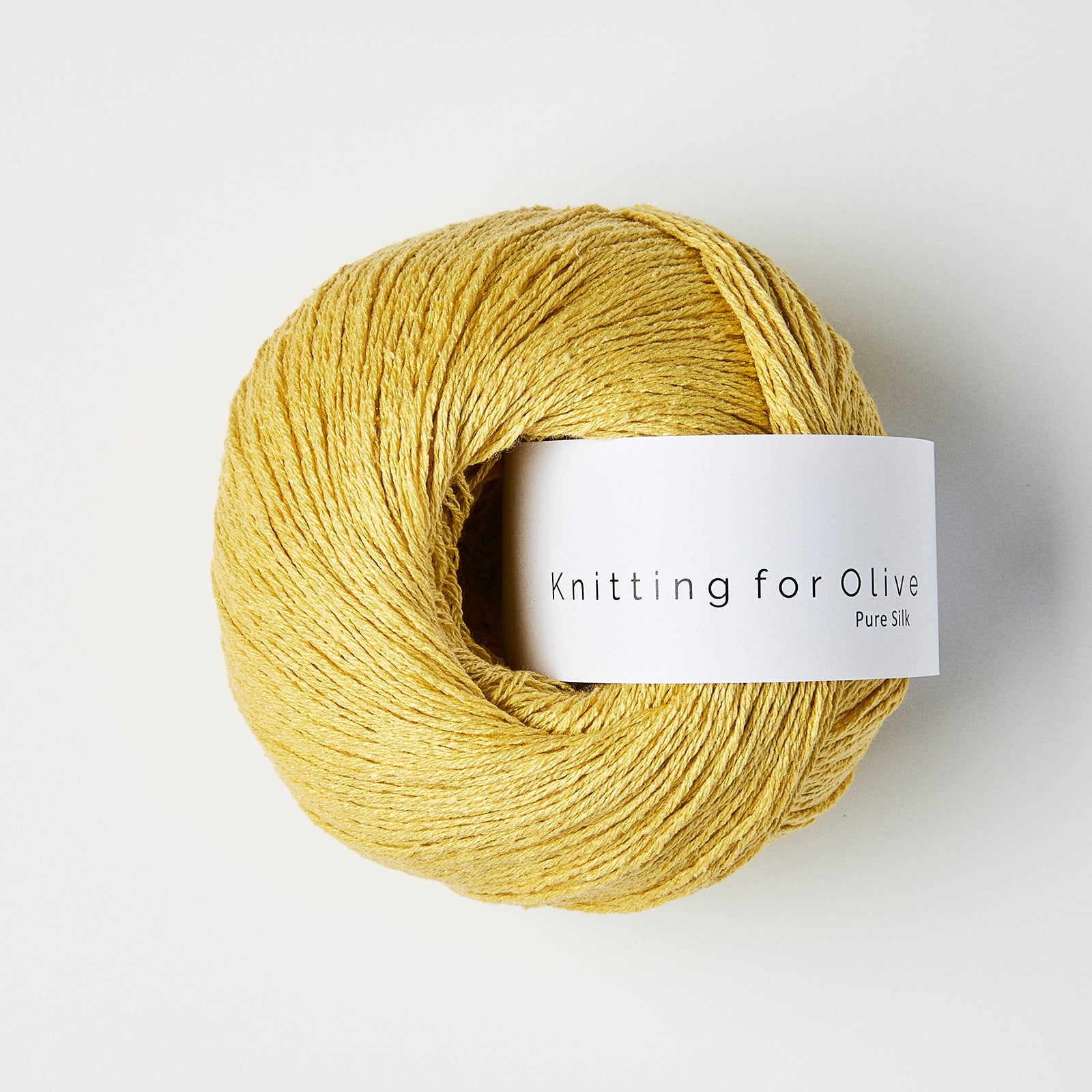 Knitting for Olive Pure Silk ipliği, cildinize ipeksi dokunuş ve doğal parlaklık sunar.