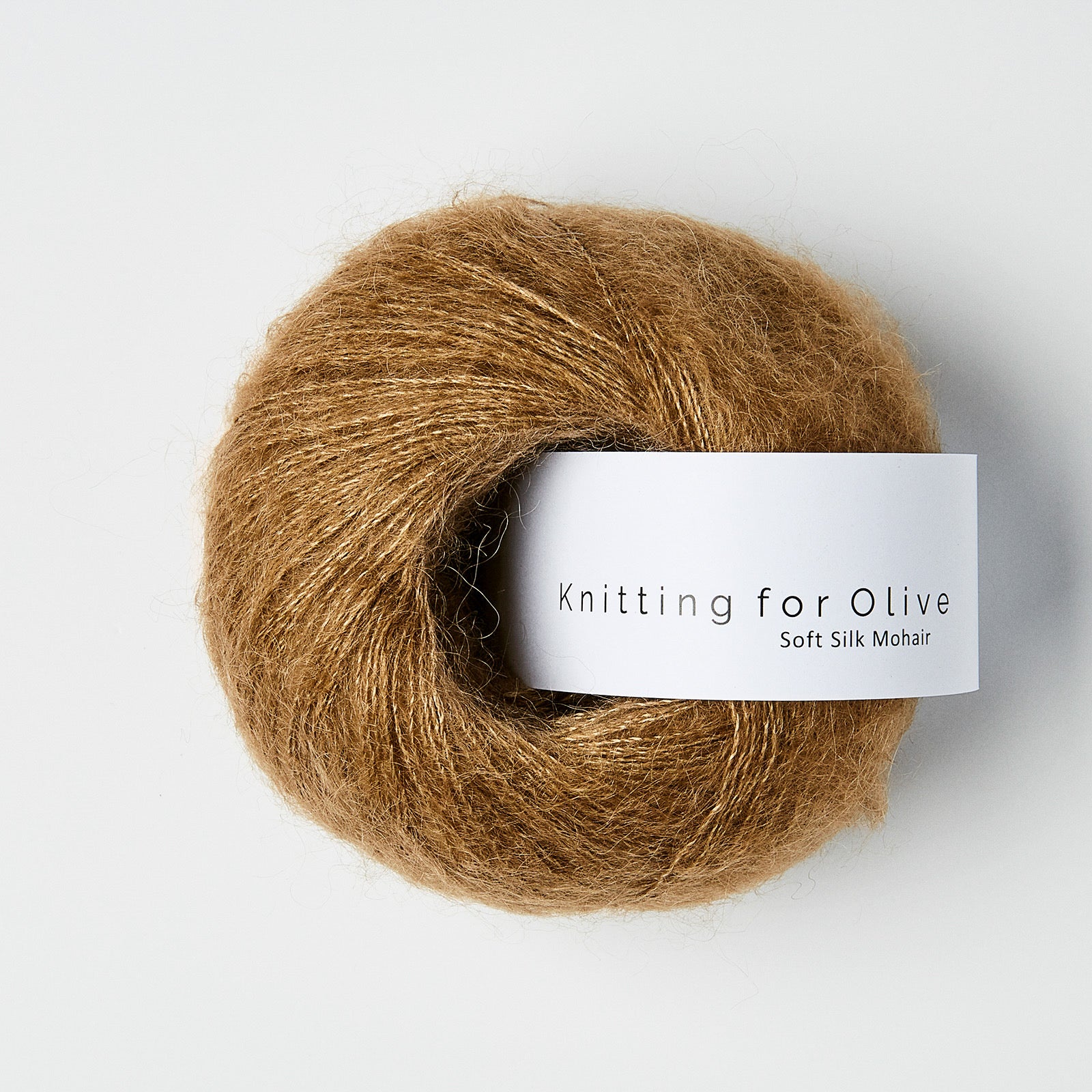 Deve tüyü rengi yumuşacık Soft Silk Mohair ile örgülerinize hafif ve zarif bir sıcaklık katın.