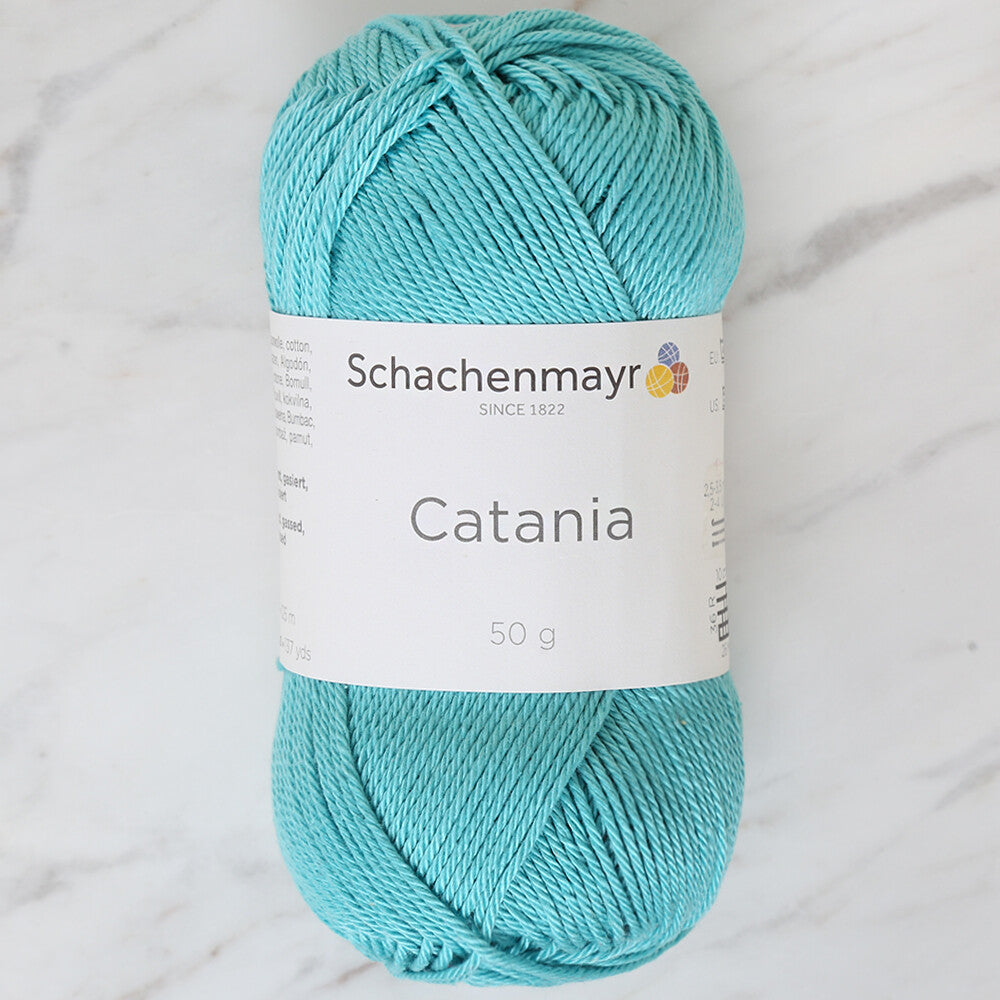 Schachenmayr Catania 50gr Turkuaz el örgü ipi, canlı rengi ve yumuşak dokusuyla amigurumi ve dantel projeleriniz için idealdir.
