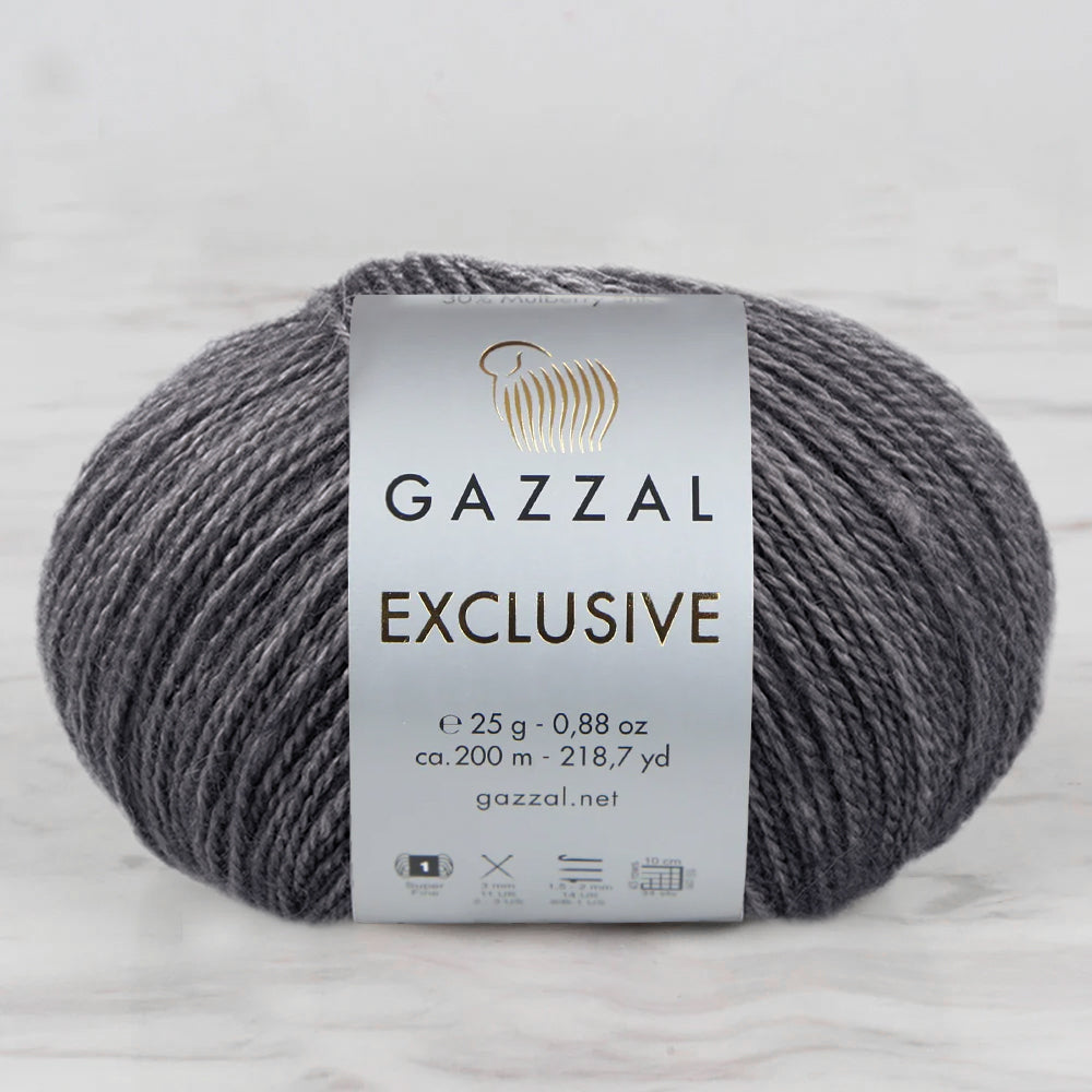 Gazzal Exclusive gri el örgü ipi 9908, yumuşak dokusu ve dayanıklı yapısıyla örgü projelerinize zarafet katar.