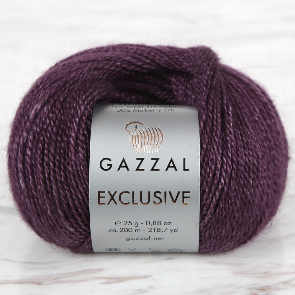 Gazzal Exclusive 9910 mor el örgü ipi, yumuşak dokusu ve canlı rengiyle şık tasarımlar yaratmanızı sağlar.