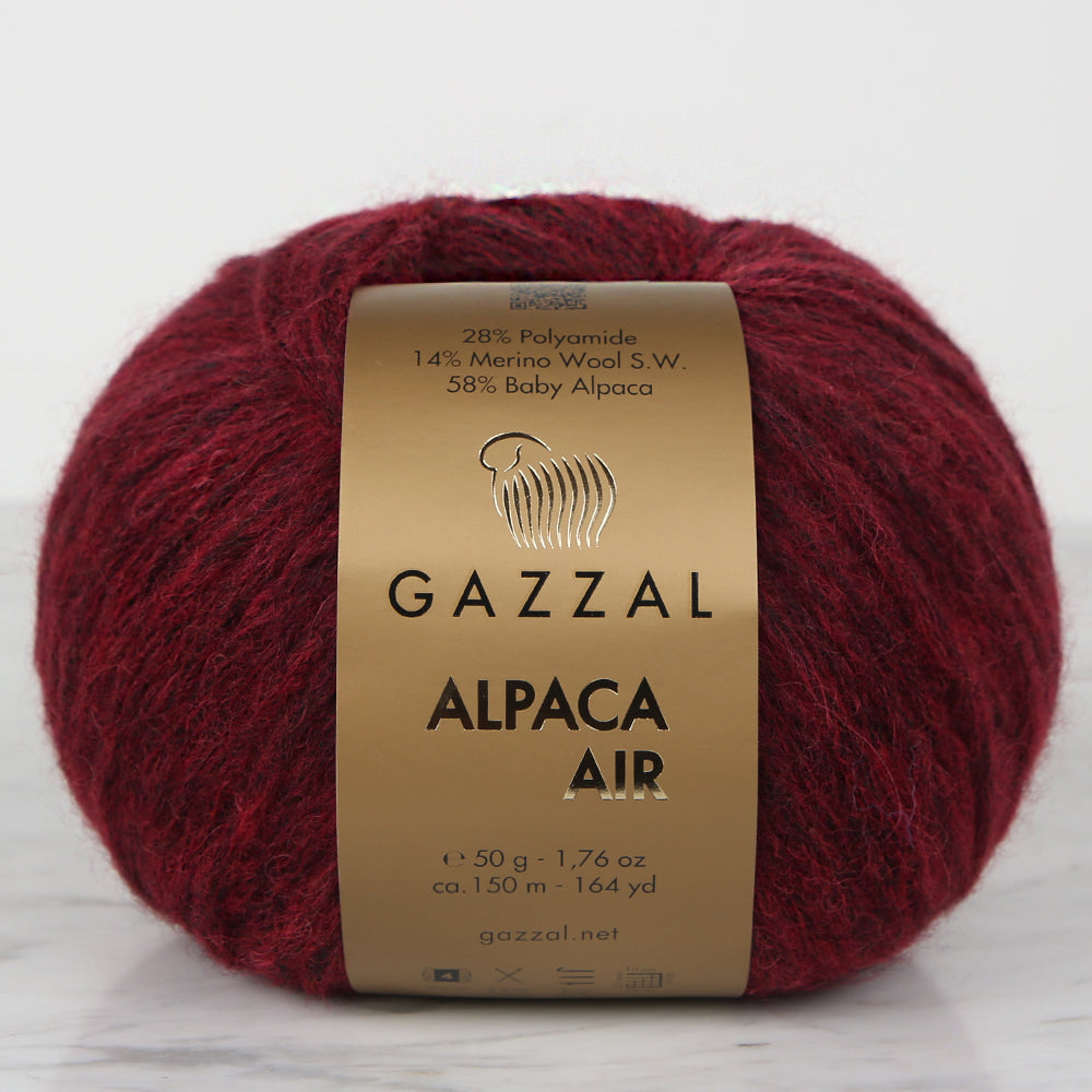 Gazzal Alpaca Air Bordo, yumuşak alpaka yünü ve hafif dokusuyla örgülerinize sıcaklık katan canlı bir el örgü ipi.