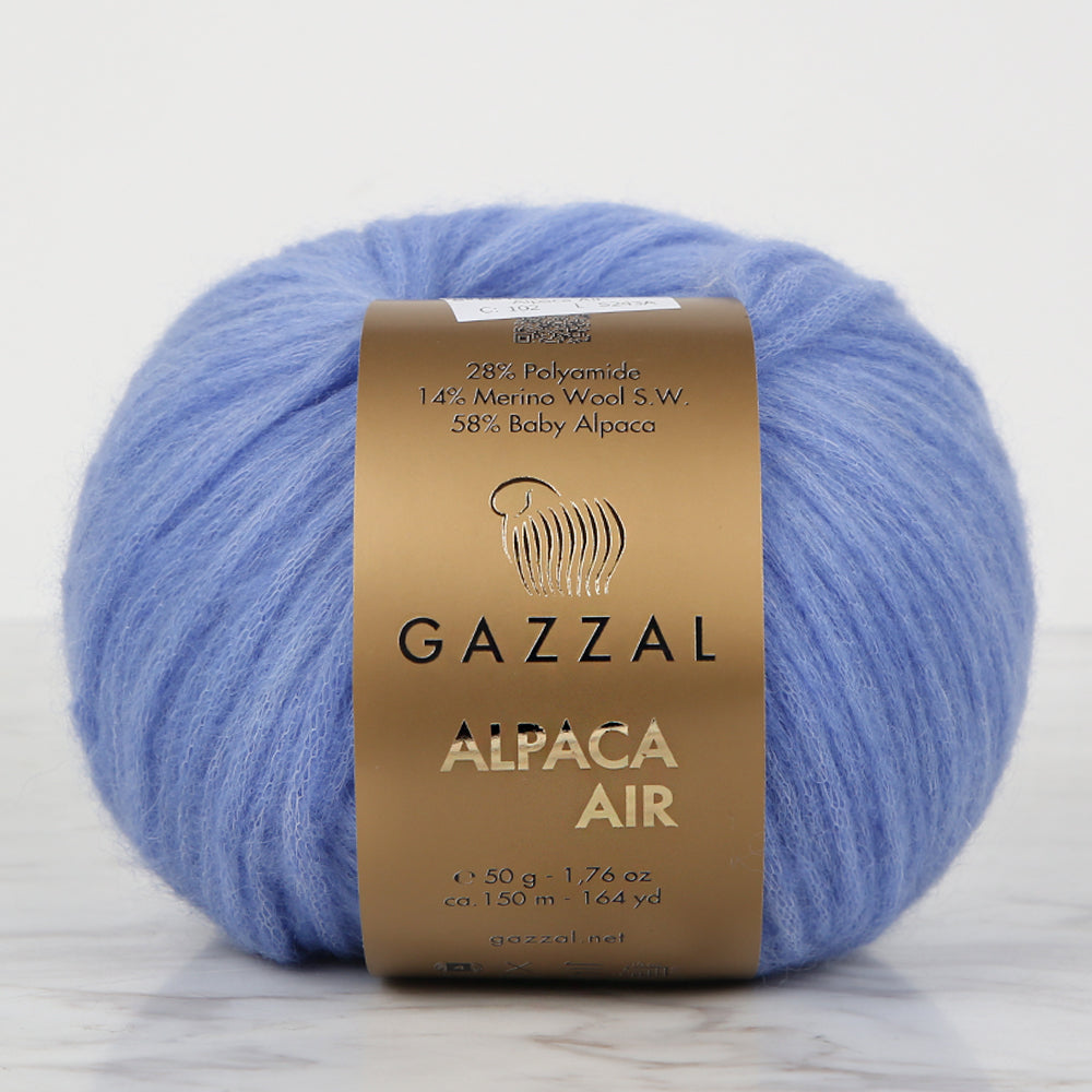 Gazzal Alpaca Air Mavi İp ile yumuşak dokulu ve solmaz renkli örgülerinize hafiflik katın.