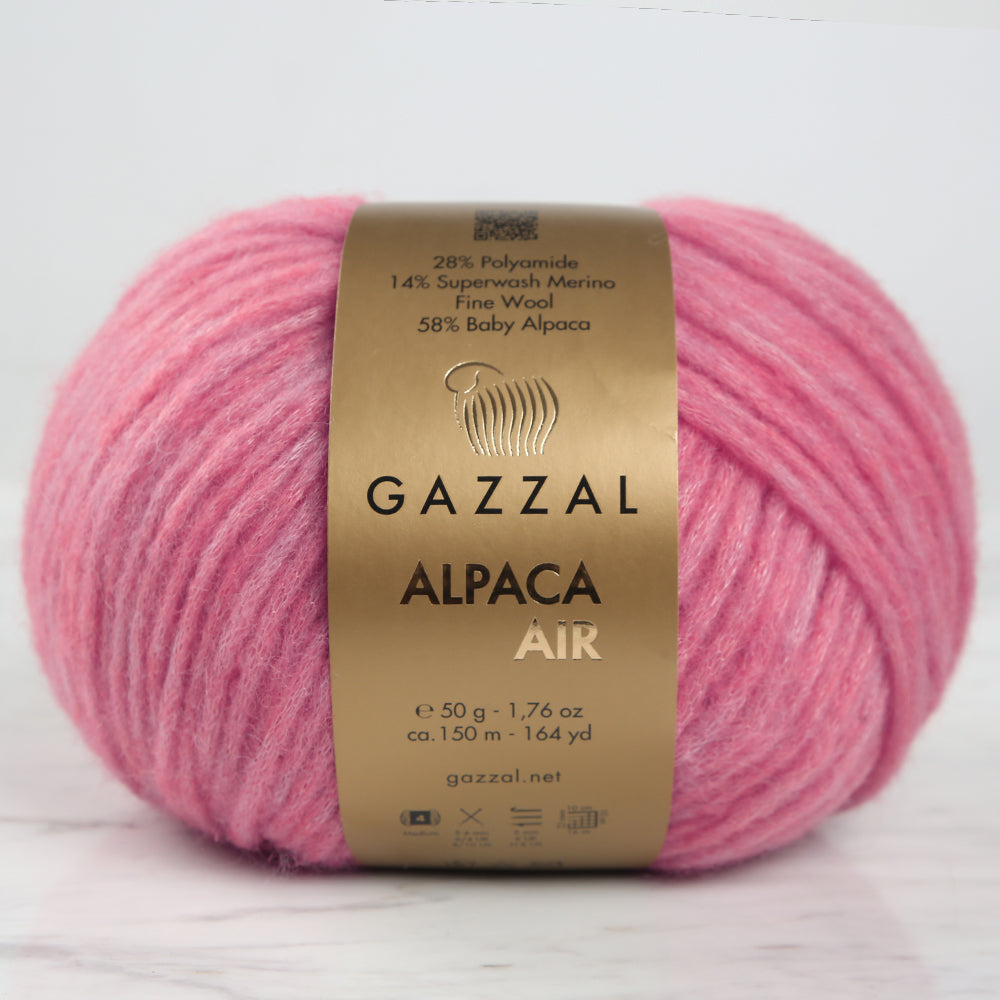 Gazzal Alpaca Air Pembe el örgü ipi, yumuşaklık ve zarafet sunan hafif bir iptir.