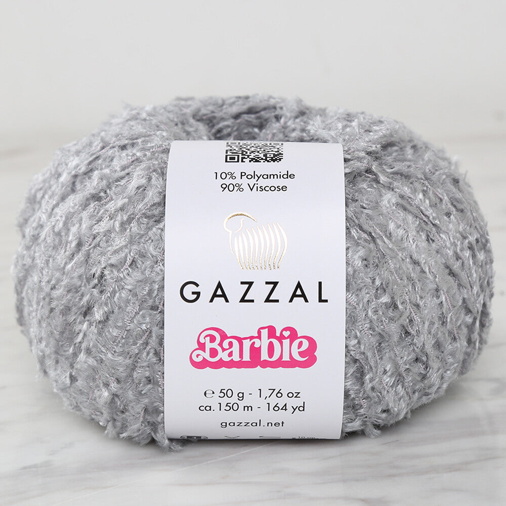 Gazzal Barbie Gri El Örgü İpi 10702 ile bebeklerinize yumuşak ve dayanıklı tasarımlar yaratın.